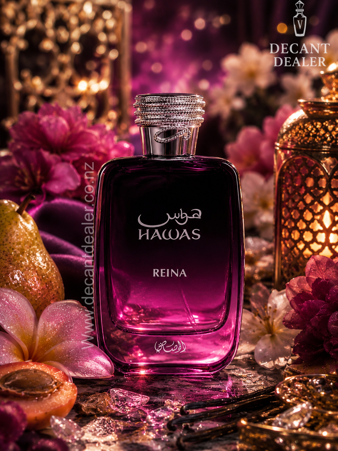 A bottle of Hawas Reina perfume displayed in a luxurious setting with purple flowers, gold lanterns, and warm bokeh lights. The brand logo 'DECANT DEALER' is visible in the top right corner.